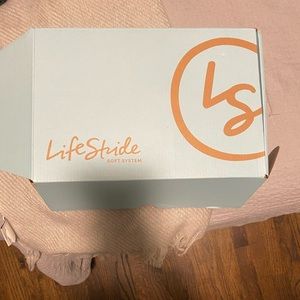 Brand new never worn. Black heels with crisscross spandex material on top.